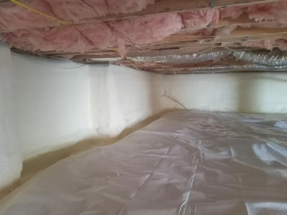 Crawl space encapsulation with closed-cell spray foam for Storm Damage Roof Repair in Hammond